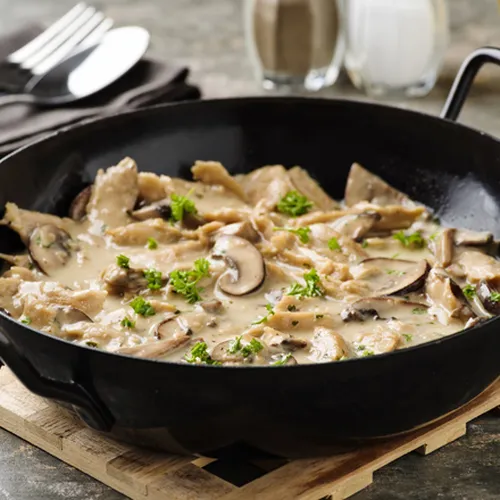 Hähnchenstreifen in Champignon-Rahmsauce